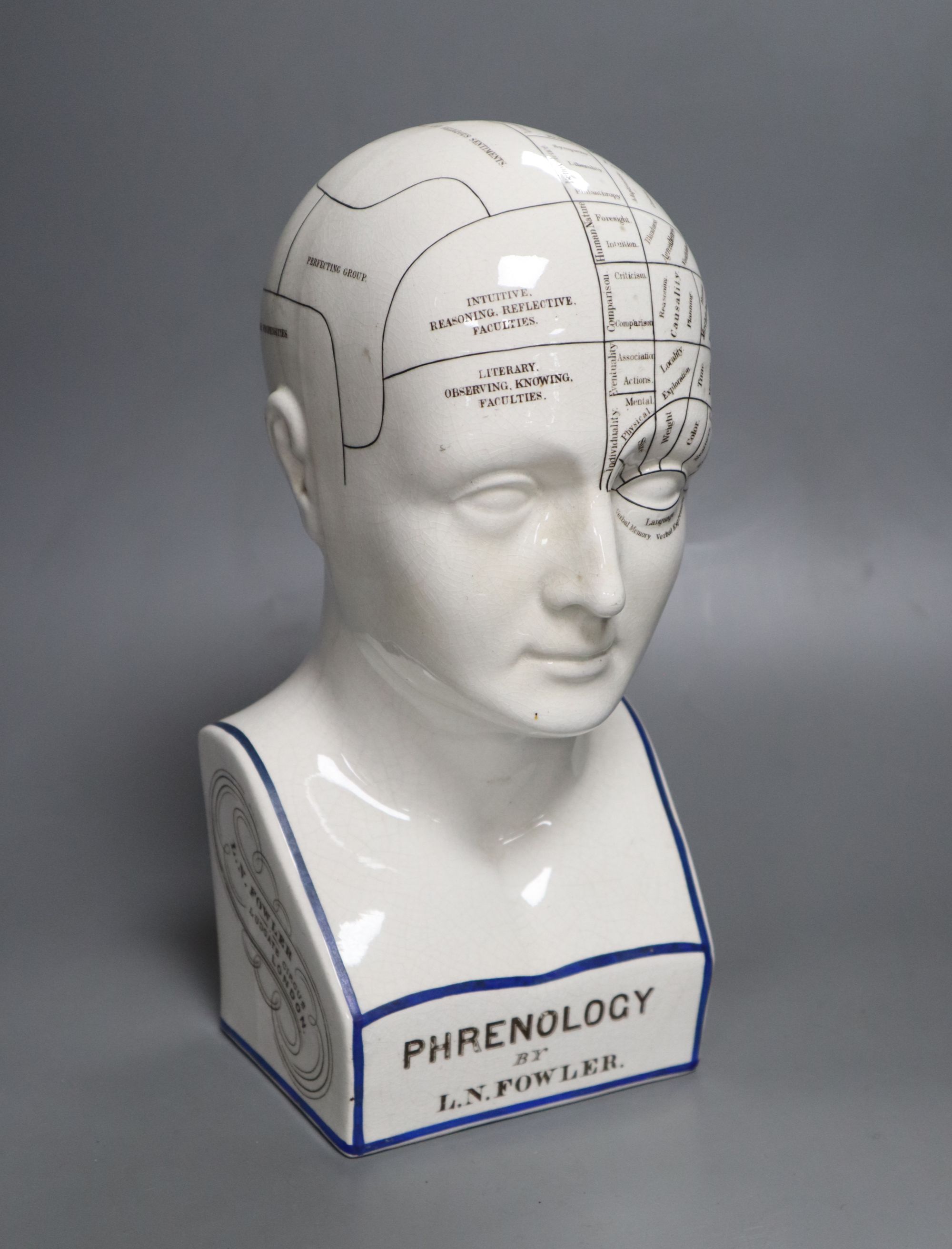 An L.N. Fowler pottery phrenology head, late 19th century, height 29cm